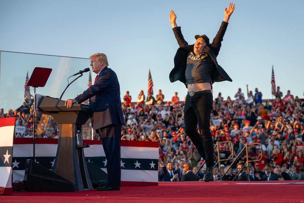 Tesla CEO Elon Musk joins former President and candidate Donald Trump on stage at a campaign rally in Butler, Pennsylvania, on Oct. 5, 2024.