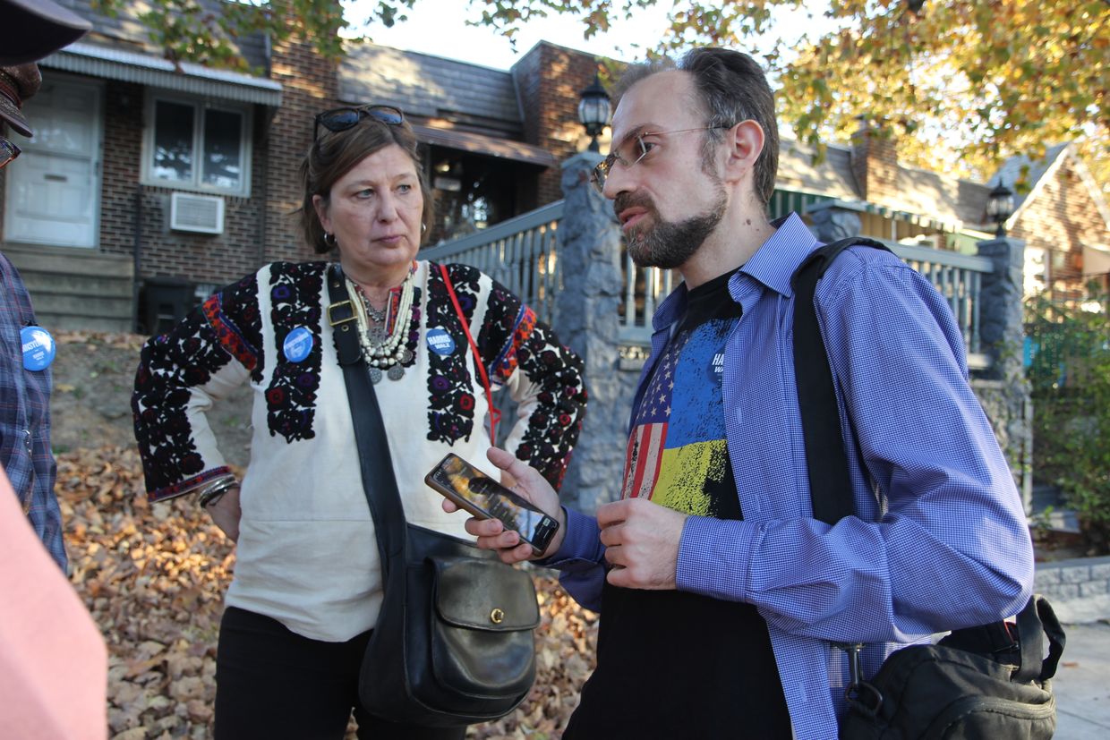 Sophika Lashchyk-Tytla, a Ukrainian American, volunteers for the Harris campaign by door-knocking in Philadelphia on Oct. 26, 2024.