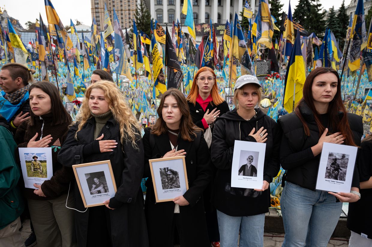 Kyiv residents attend a memorial ceremony for the fallen defenders of Ukraine