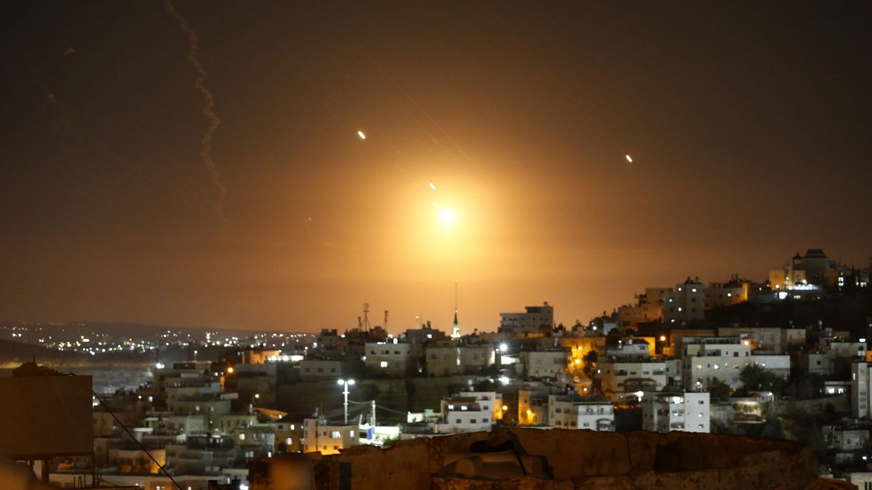 Many rockets, fired from Iran, are seen over Jerusalem from Hebron, West Bank on Oct. 1, 2024.