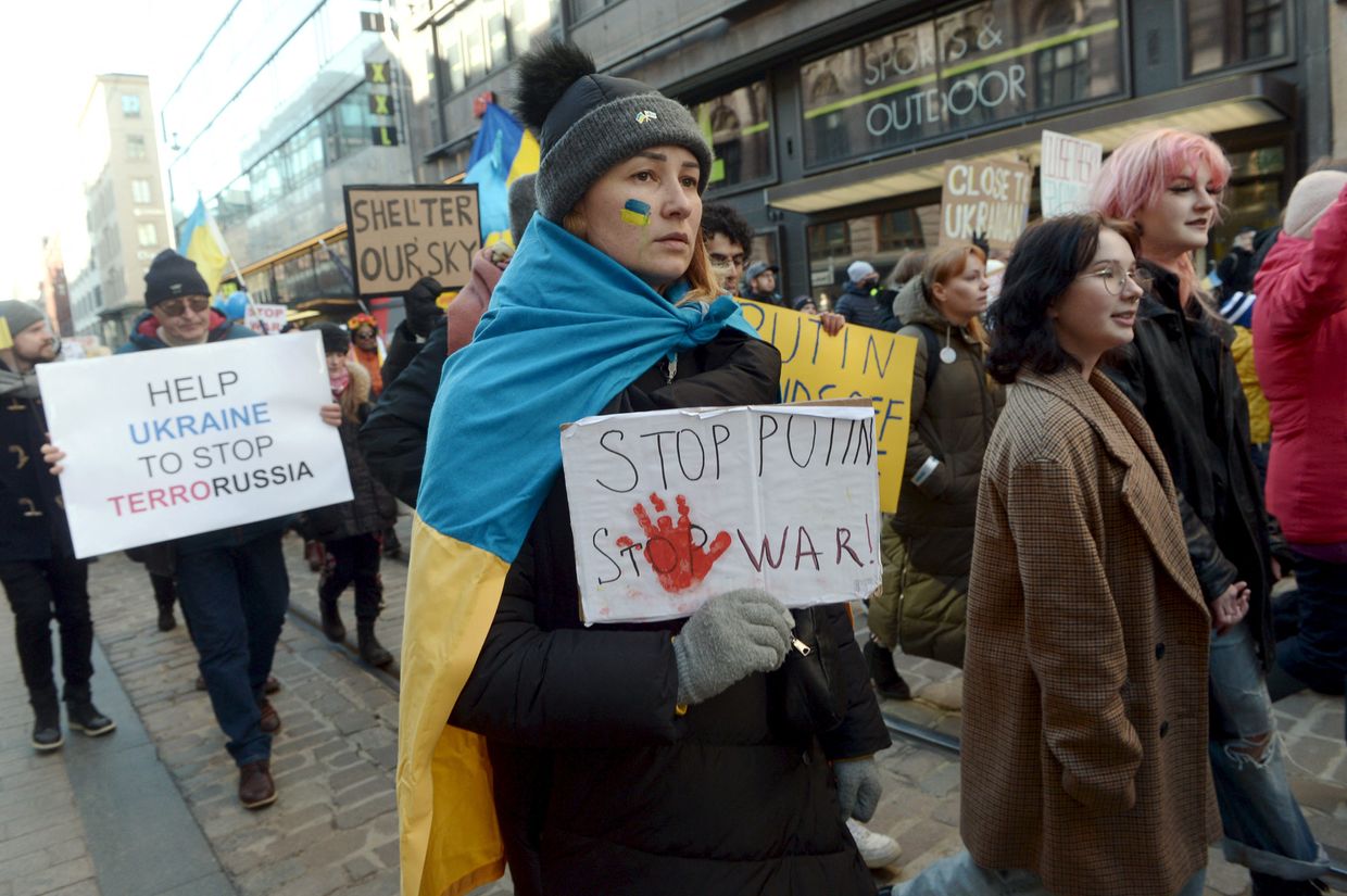 Protestors show their support for Ukraine as they take part in a demonstration against Russia's invasion of Ukraine, in Helsinki, Finland on March 5, 2022.