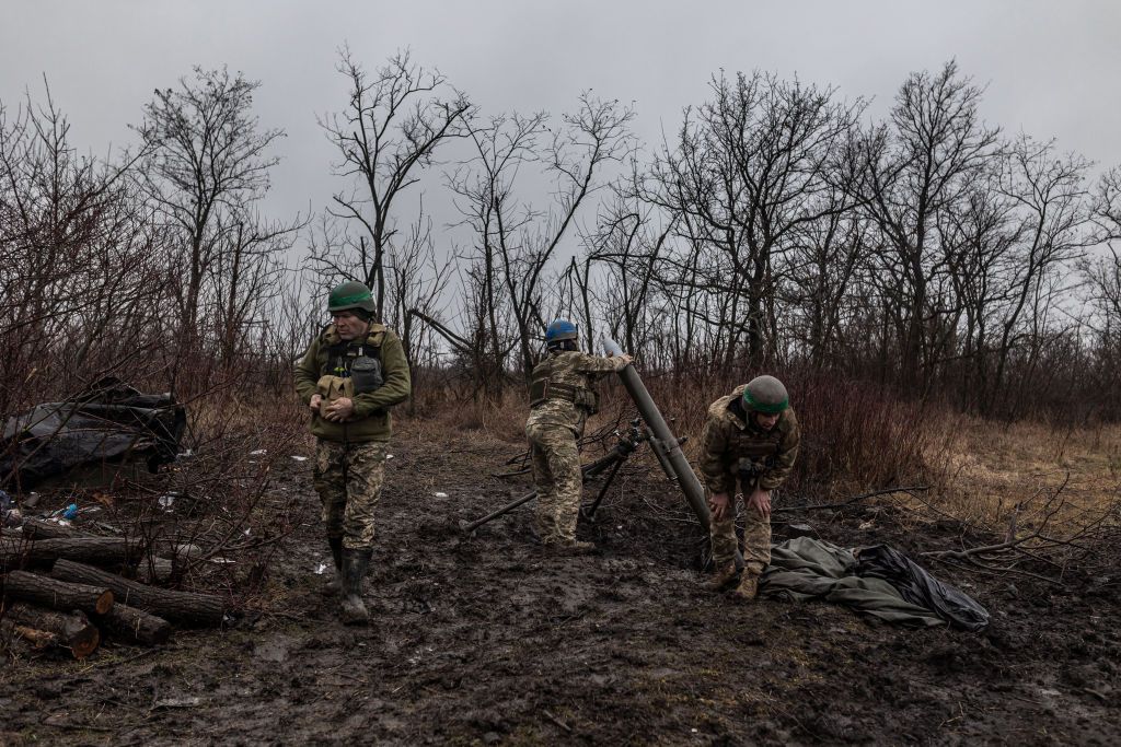 Ukrainian soldiers preparing a mortar in the direction of Velyka Novosilka in Donetsk Oblast on Feb. 9, 2024. 