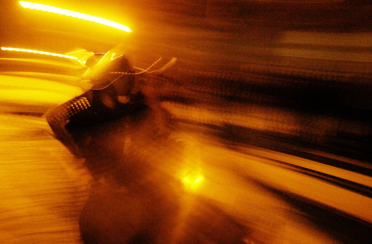 Riot police run to switch shifts with colleagues in the presidential compound during the "Orange Revolution" in Kyiv, Ukraine, on Nov. 29, 2004.