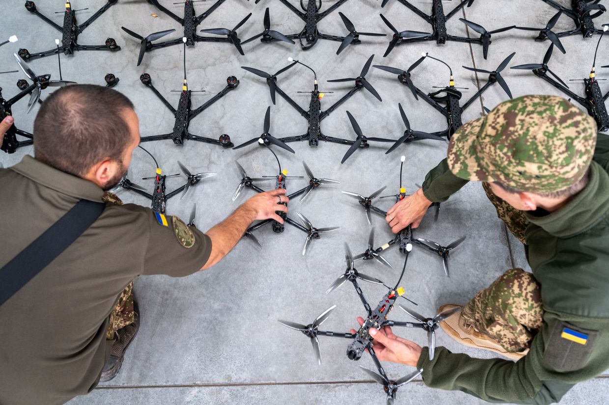 Soldiers of the Armed Forces inspect the FPV drones during the handover from the volunteer organization in Lviv, Ukraine on Sep. 13, 2024. 