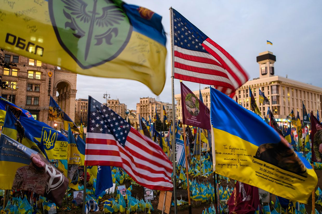 American flags on a makeshift memorial honor Ukrainian Armed Forces soldiers killed in action with Russian troops 