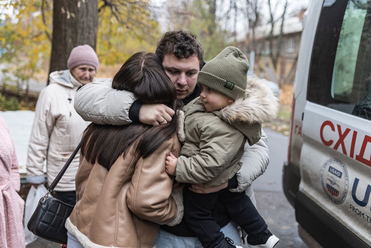  People prepare for evacuation by Vostok SOS volunteers, aiding victims of Russian forces, in Druzhkivka, Ukraine, on Nov. 14, 2024.