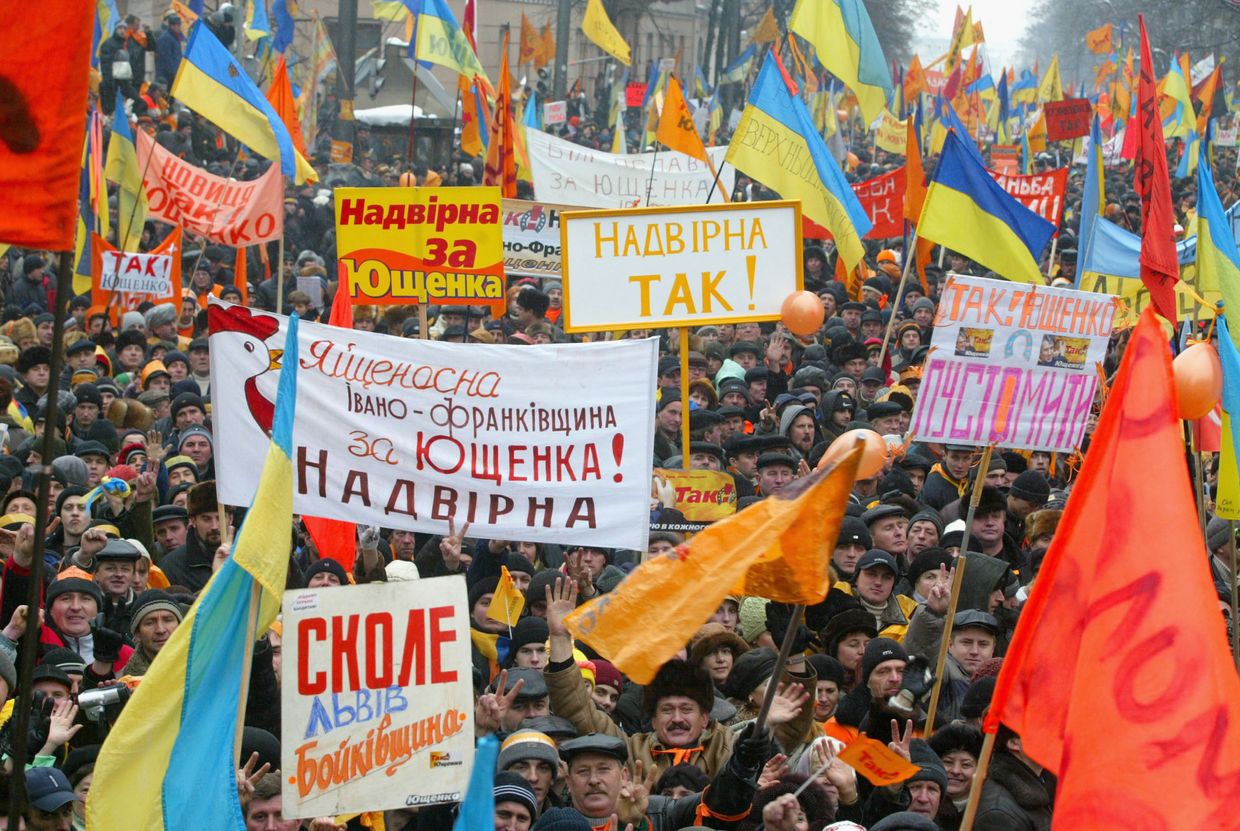 Supporters of opposition presidential candidate Viktor Yushchenko surround the parliament building in Kyiv, Ukraine, on Nov. 27, 2004. 