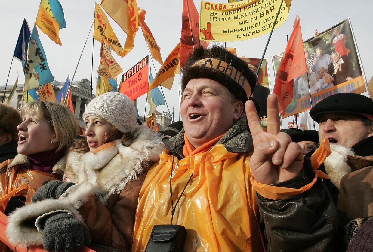  People cheer at Independence Square as President Viktor Yushchenko arrives after his inauguration in Kyiv, Ukraine, on Jan. 23, 2005.