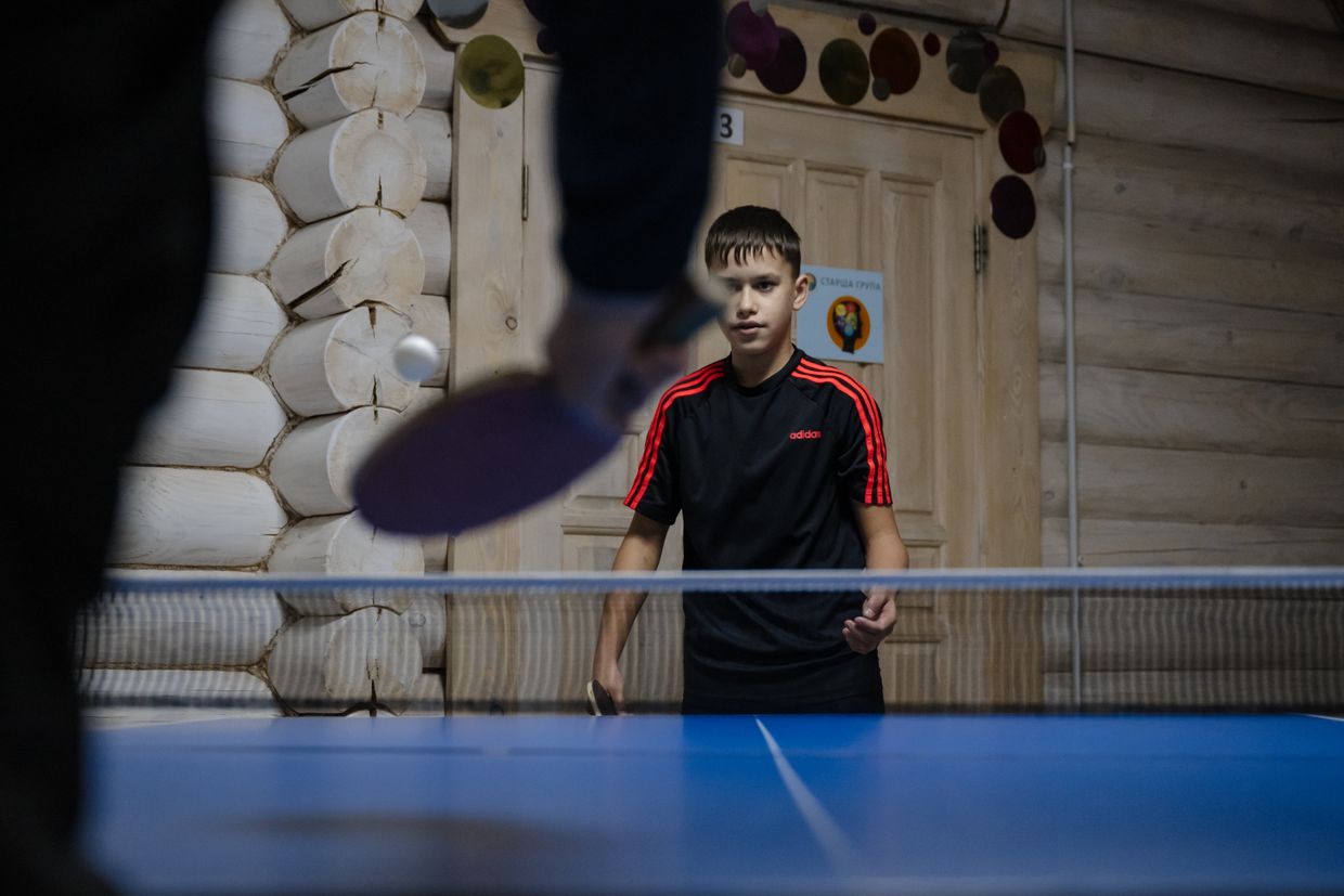 Rodion Shcherbakov plays tennis at the "7Fields" school near Kyiv, Ukraine on Dec. 5, 2024.