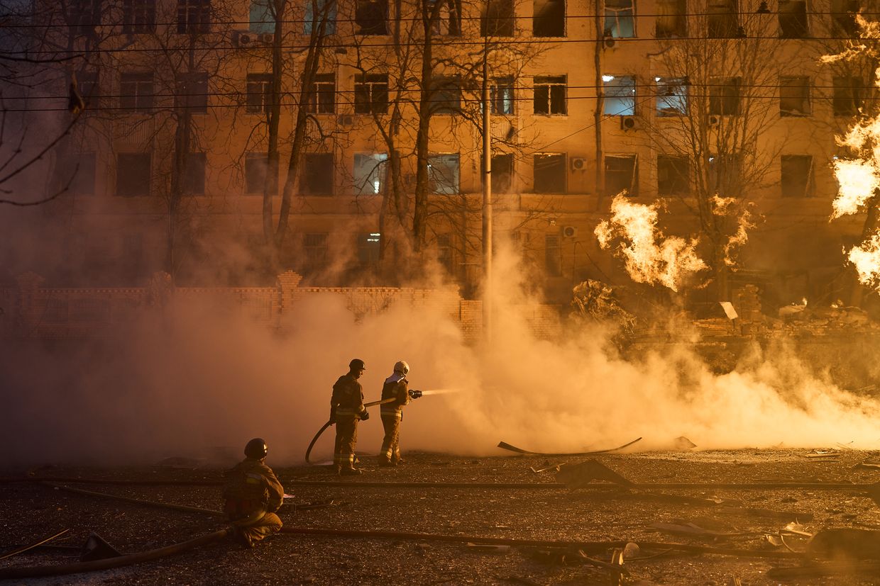 Ukrainian rescue services eliminate the consequences of a Russian ballistic missile hitting the city center in Kyiv, Ukraine, on Dec. 20, 2024. 