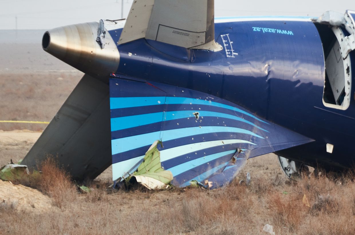 Loud bang heard before Azerbaijan Airlines plane crashed, passengers tell Reuters