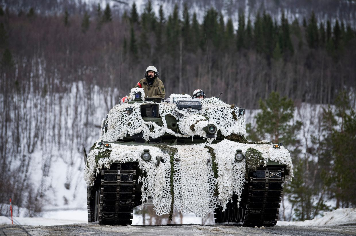 Norwegian Armed Forces soldiers operate a tank during the Cold Response 22 exercise at Setermoen, Norway, March 22, 2022.