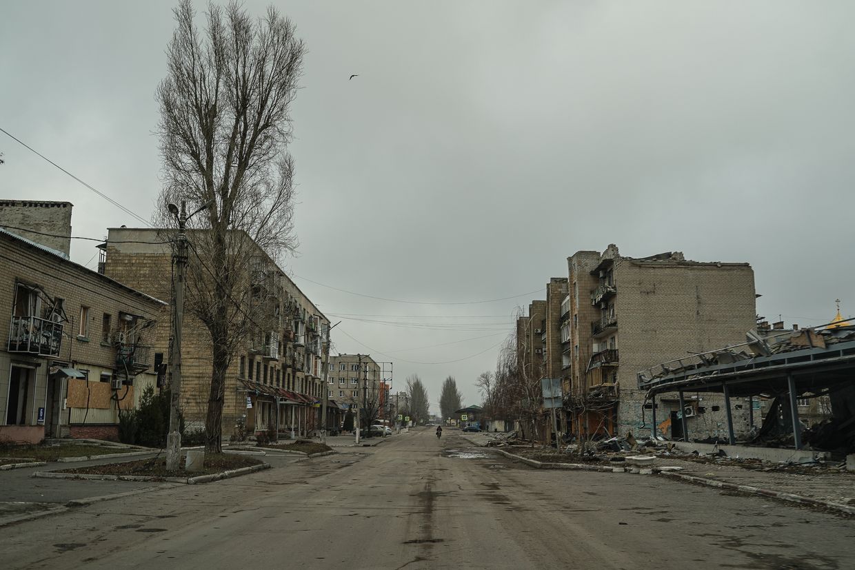 People walk down an empty street in Pokrovsk, Donetsk Oblast, Ukraine, on Dec. 26, 2024.