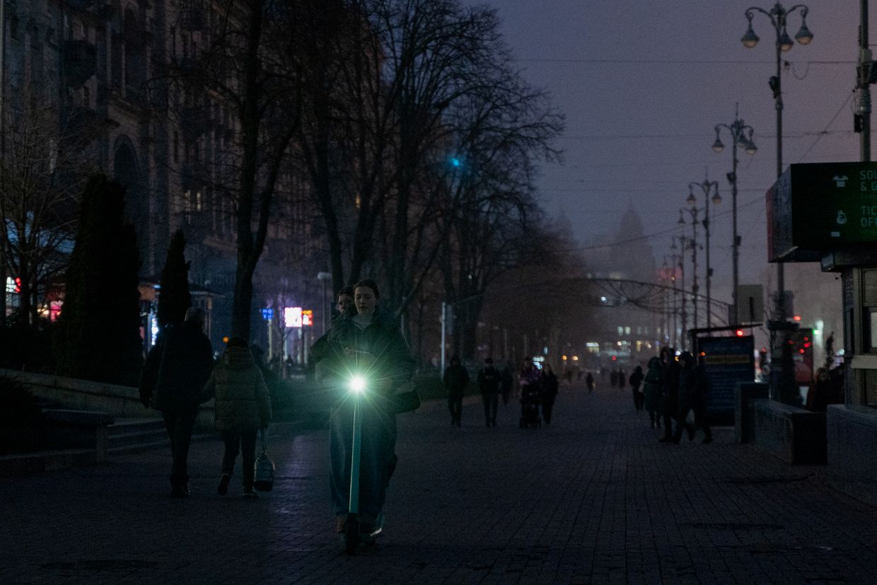 Women ride a scooter on Khreshchatyk Street in Kyiv, Ukraine, on Jan. 23, 2025, amid the Russian invasion. 