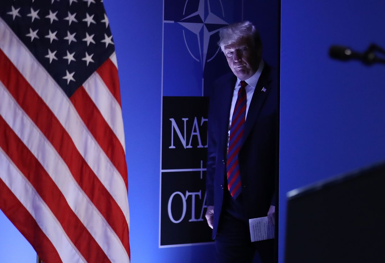  Then-U.S. President Trump speaks to the media at a press conference on the second day of the 2018 NATO Summit in Brussels, July 12, 2018.