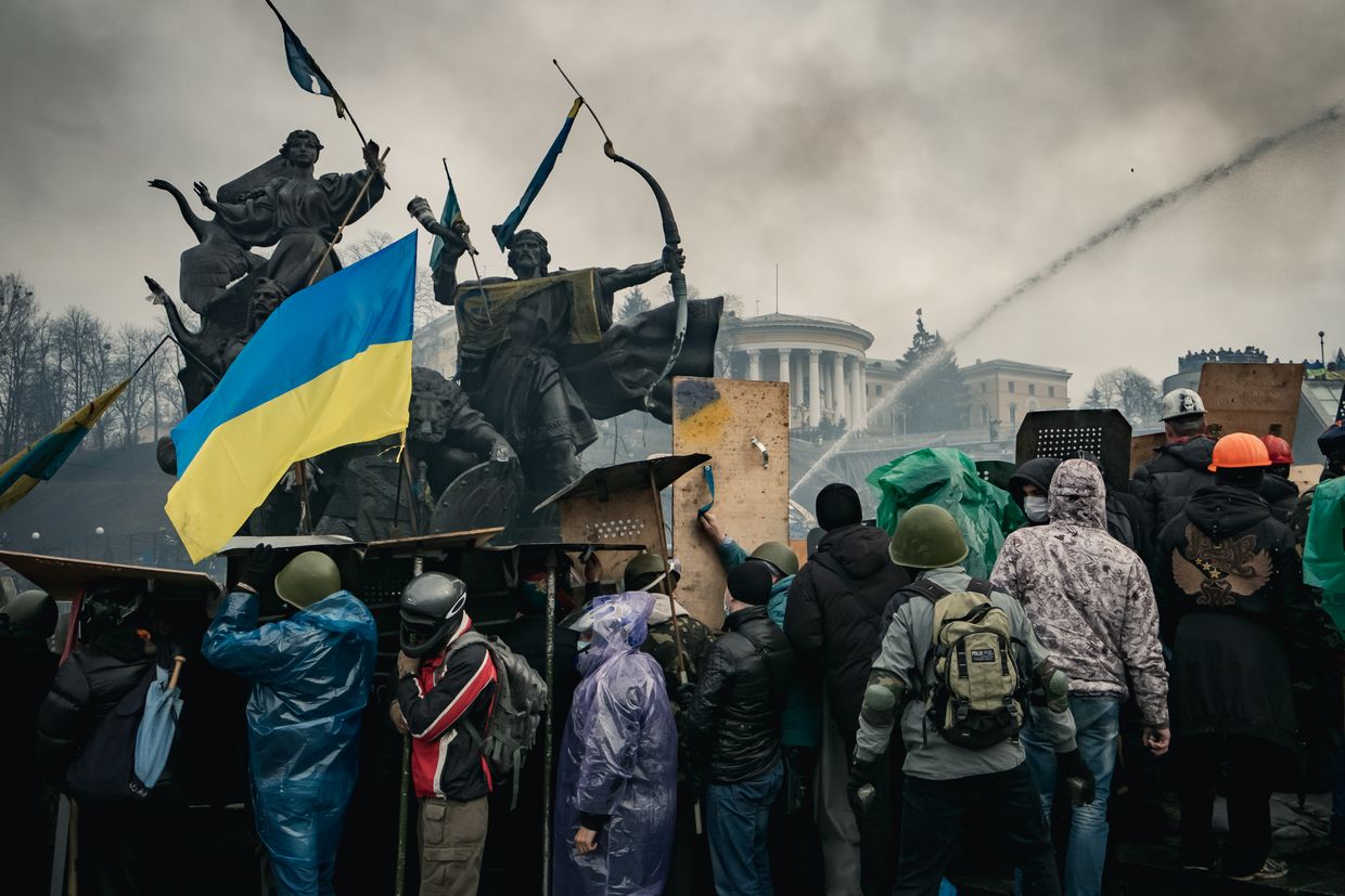 Protesters clash with government forces at barricades on Independence Square in Kyiv, Ukraine, on Feb. 19, 2014. 