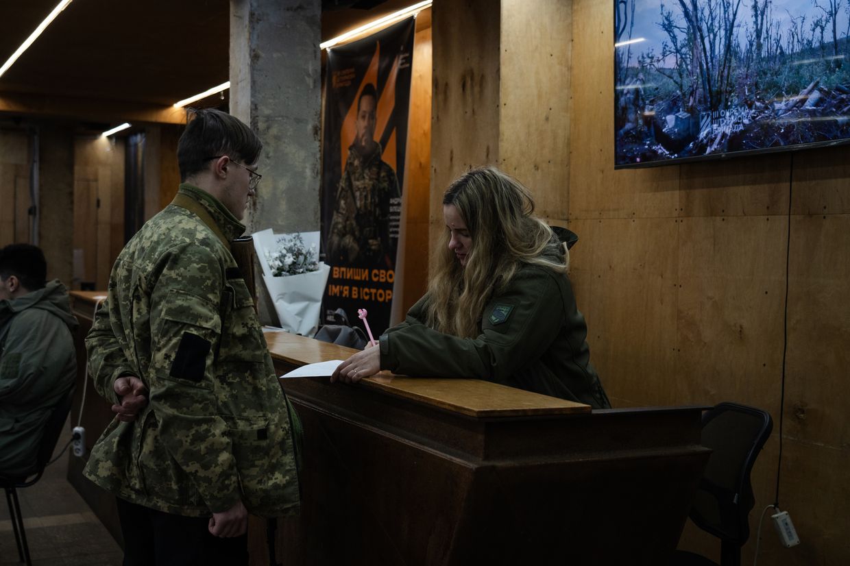 A military officer from the third separate assault brigade does recruitment work in Kyiv, Ukraine, on March 15, 2024.