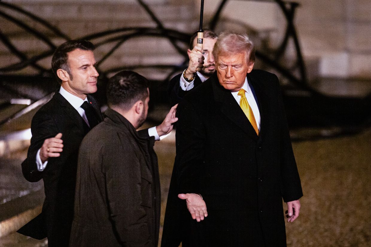 US President Donald Trump shakes hands with President Volodymyr Zelensky in Paris, France, on Dec. 7, 2024. 