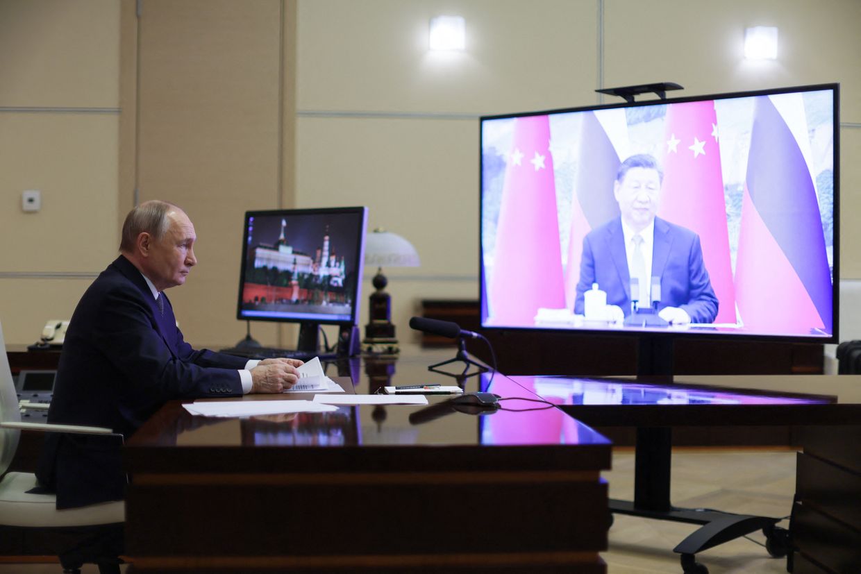 Russia's President Vladimir Putin holds a video call with China's President Xi Jinping at the Novo-Ogaryovo state residence outside Moscow, Russia, on Jan. 21, 2025.