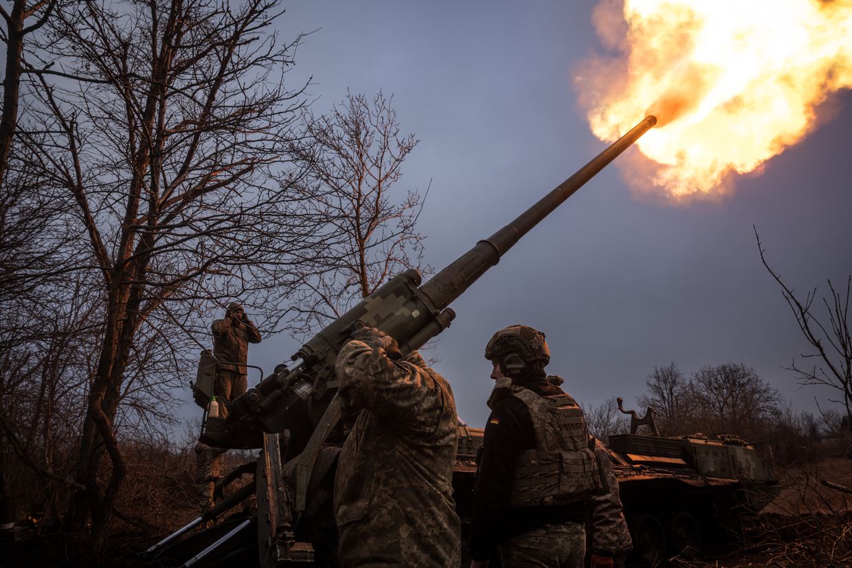 Ukrainian soldiers of the 43rd Brigade work on a Soviet-era Pion self-propelled howitzer near Chasiv Yar, Donetsk Oblast, Ukraine, on Jan. 27, 2025. 