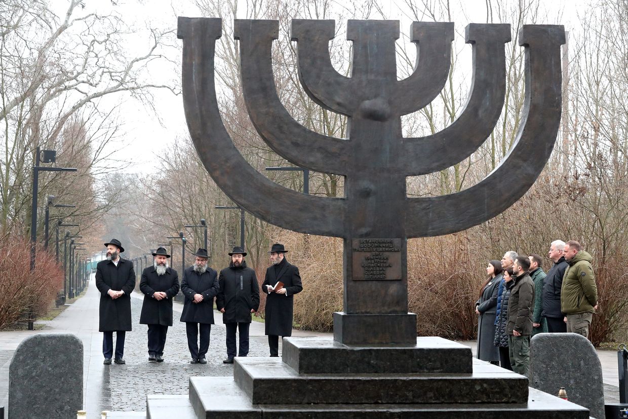 Rabbis at the Menorah monument during a Holocaust Remembrance Day at Babyn Yar in Kyiv, Ukraine, on Jan. 26, 2025.