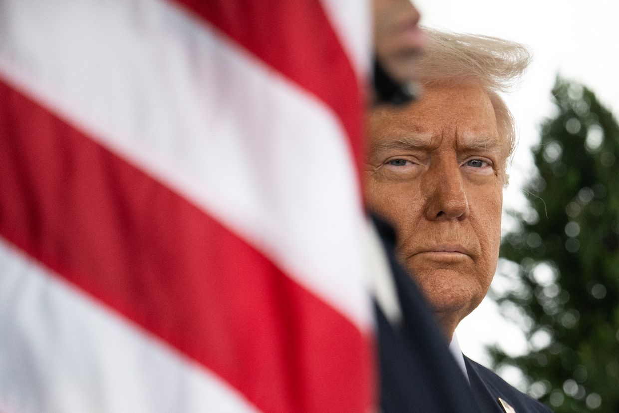 U.S. President Donald Trump waits outside the West Wing in Washington, D.C., U.S. on Feb. 11, 2025.