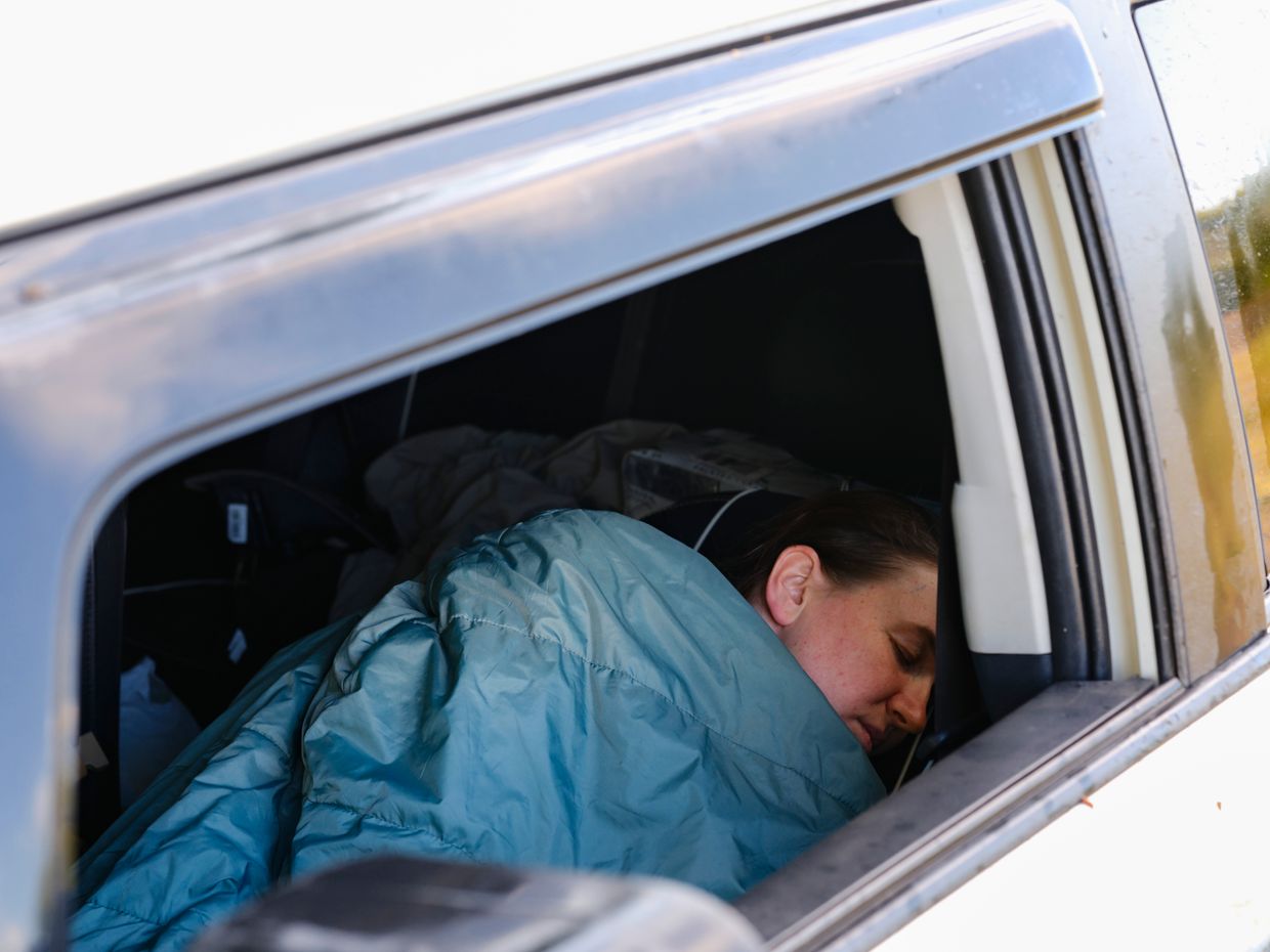 "Malysh" has been sleeping in her car for a year—this is her only "private" space, Kharkiv Oblast, Ukraine, in Aug. 2024. 