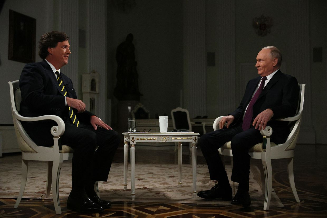 Russia's President Vladimir Putin gives an interview to US talk show host Tucker Carlson at the Kremlin, Moscow, Russia on Feb. 6, 2024.