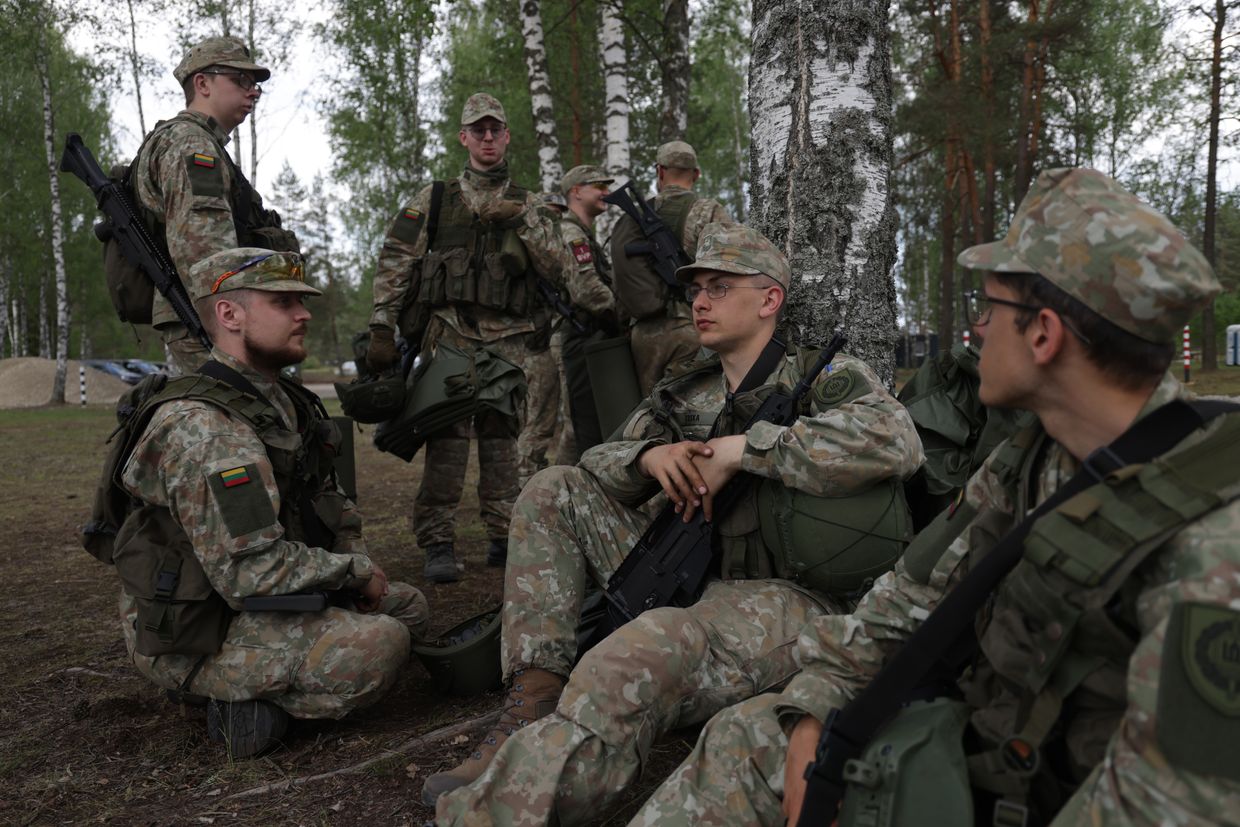 Lithuanian Army reservists train at a future German troop site near Rudninkai, Lithuania, on May 28, 2024. 