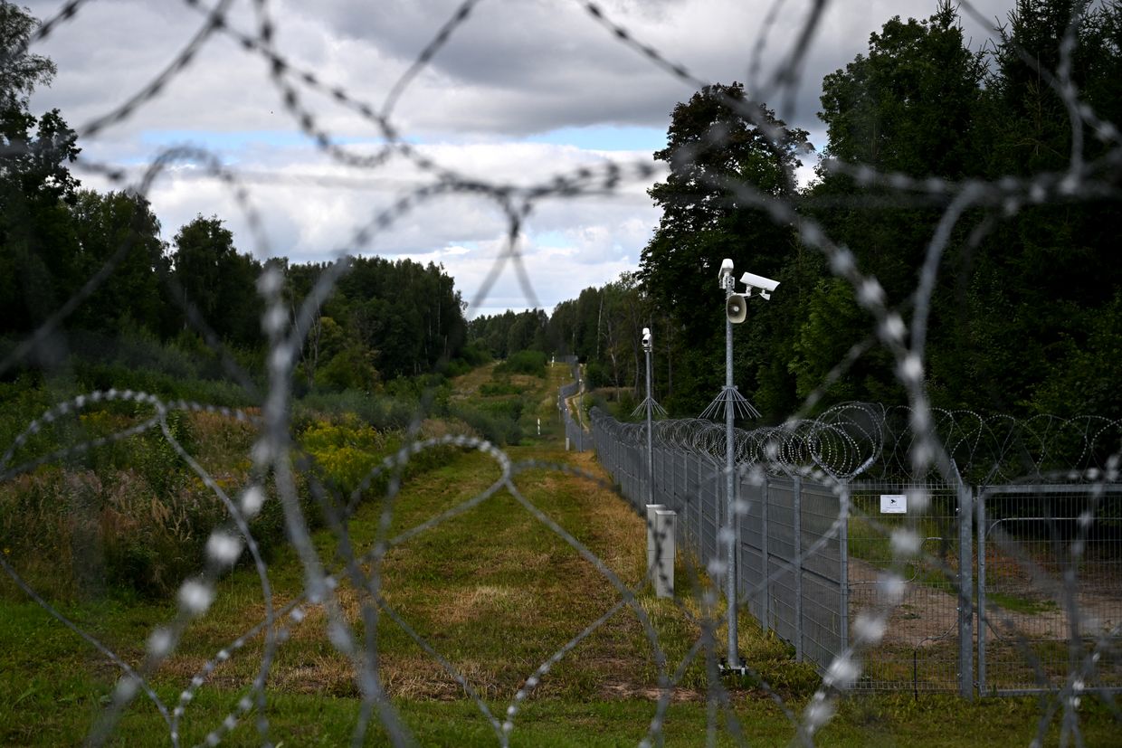 A razor wire fence lines the Polish-Lithuanian border near Kaliningrad in Wisztyniec, Poland, on Aug. 12, 2024. 