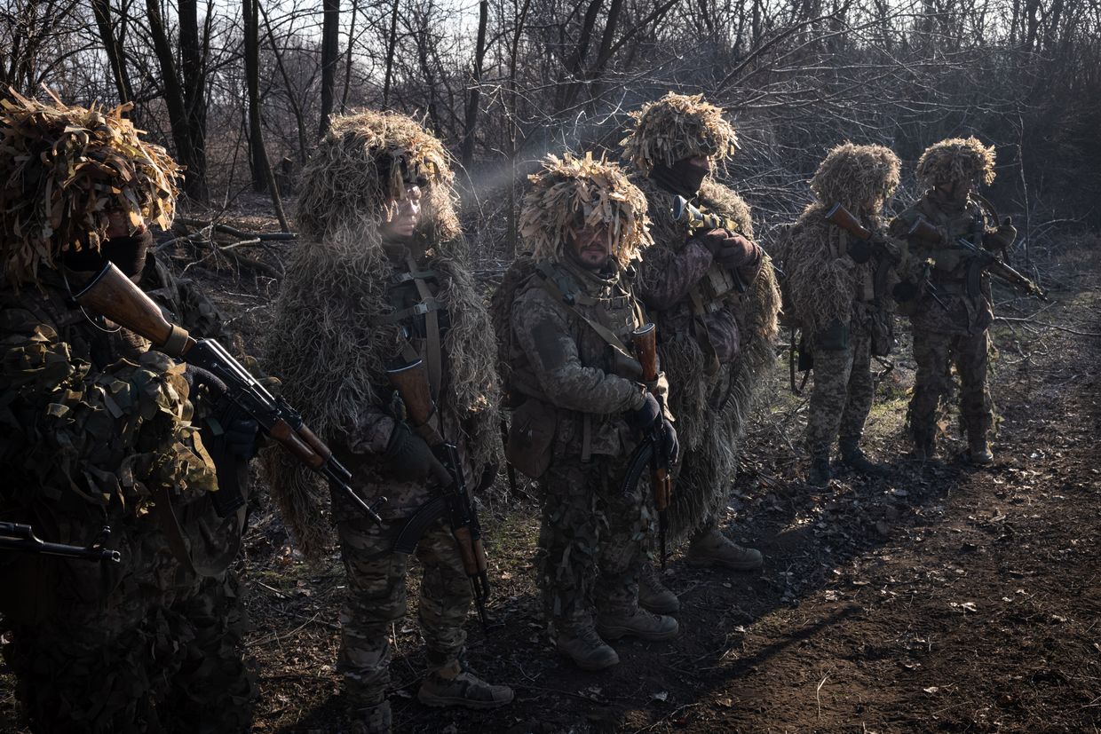 Ukrainian soldiers of the 93rd Brigade take part in combat drills outside Pokrovsk, Ukraine, on Feb. 13, 2025.