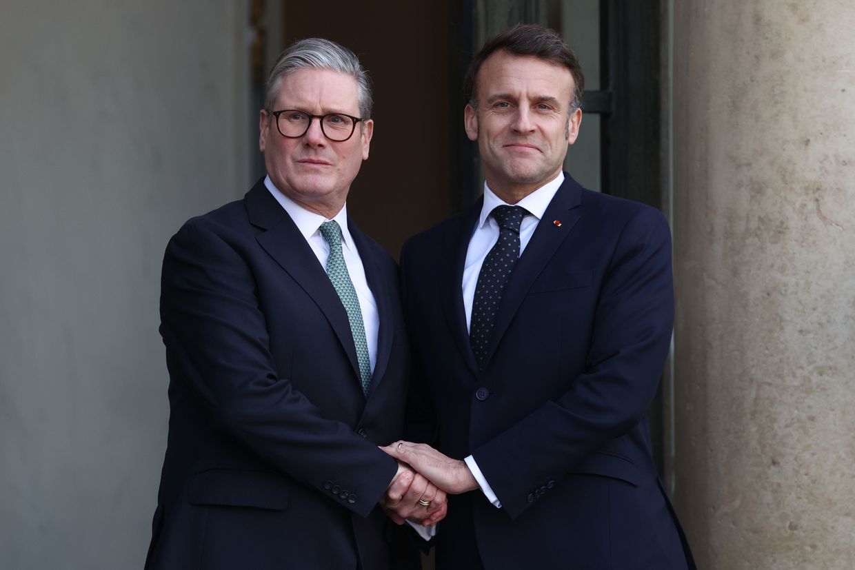 French President Emmanuel Macron welcomes British PM Keir Starmer at the Elysée Palace in Paris, France, on Feb. 17, 2025. 