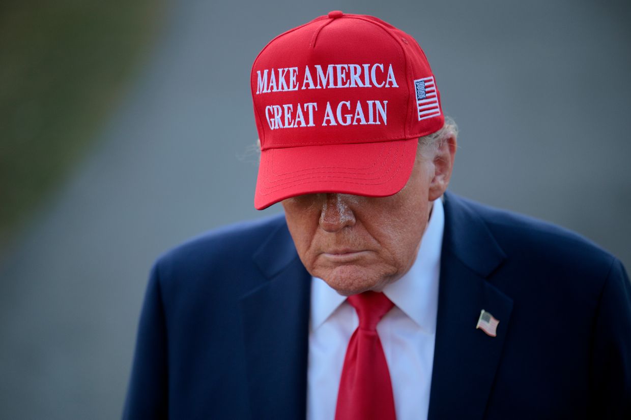 U.S. President Donald Trump speaks to reporters as he departs the White House in Washington, DC, on Feb. 28, 2025