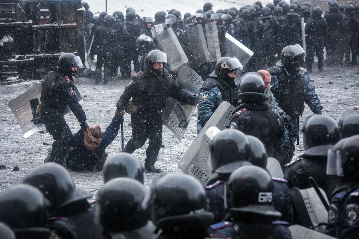 Riot police arrest protesters during clashes in the center of Kyiv, Ukraine, on Jan. 22, 2014.