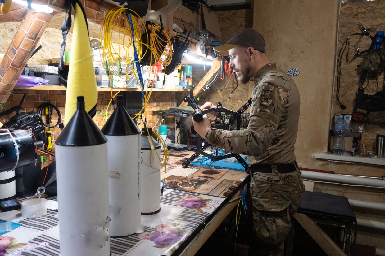 A soldier from the Azov Brigade prepares a fiber optic drone in Donetsk Oblast, Ukraine, on April 23, 2025.