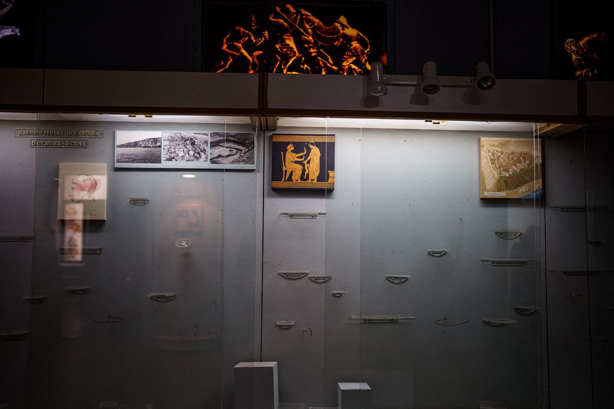 Empty glass cases at Kherson Regional Museum amid Russian invasion, in Kherson, Ukraine, on Dec. 22, 2022.