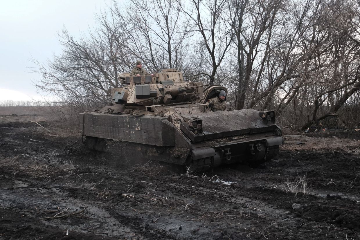 Ukrainian soldiers of the 47th Mechanized Brigade drive an M2 Bradley infantry fighting vehicle toward Avdiivka in Donetsk Oblast, Ukraine, on Feb. 23, 2024.