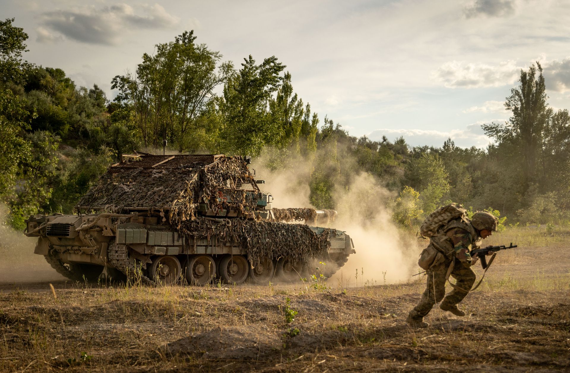 A T-80 tank from the 80th Air Assault Brigade fires during training near Chasiv Yar, Ukraine, on July 20, 2024.