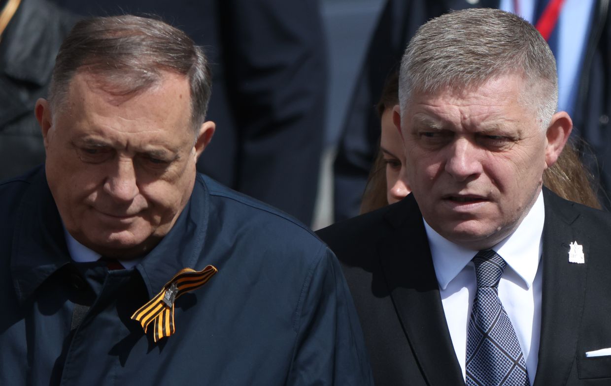 Slovak Prime Minister Robert Fico (R) and President of Republika Srpska Milorad Dodik (L) arrive for a wreath-laying ceremony at the Tomb of the Unknown Soldier in Moscow, Russia, on May 9, 2025.