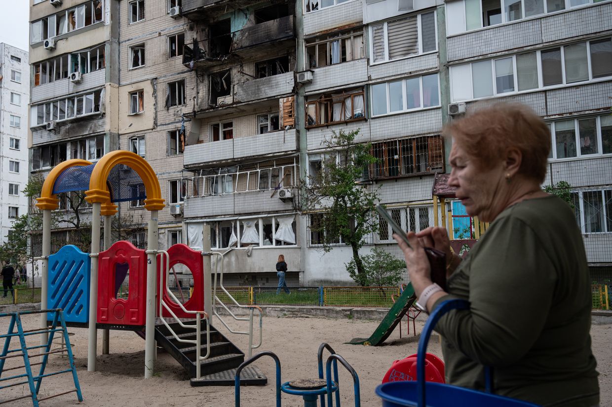 A local resident stands at the site of a Russian drone attack in Kyiv, Ukraine, on May 24, 2025.