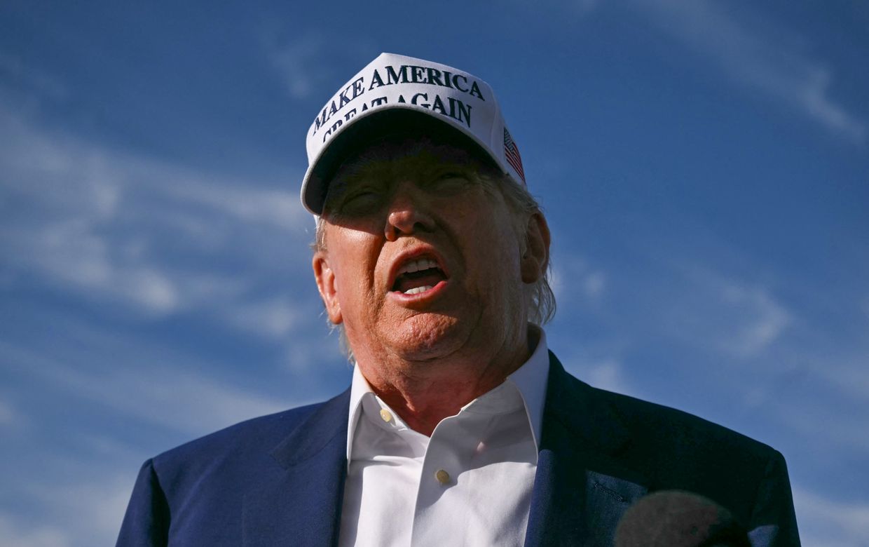 U.S. President Donald Trump speaks to journalists before boarding Air Force One at Morristown Municipal Airport in Morristown, New Jersey, on May 25, 2025. 