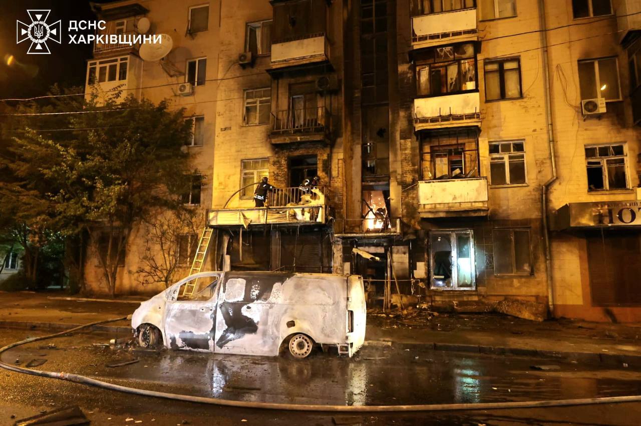 Emergency services respond to a fire in the aftermath of a Russian drone attack in Kharkiv overnight on May 2, 2025.