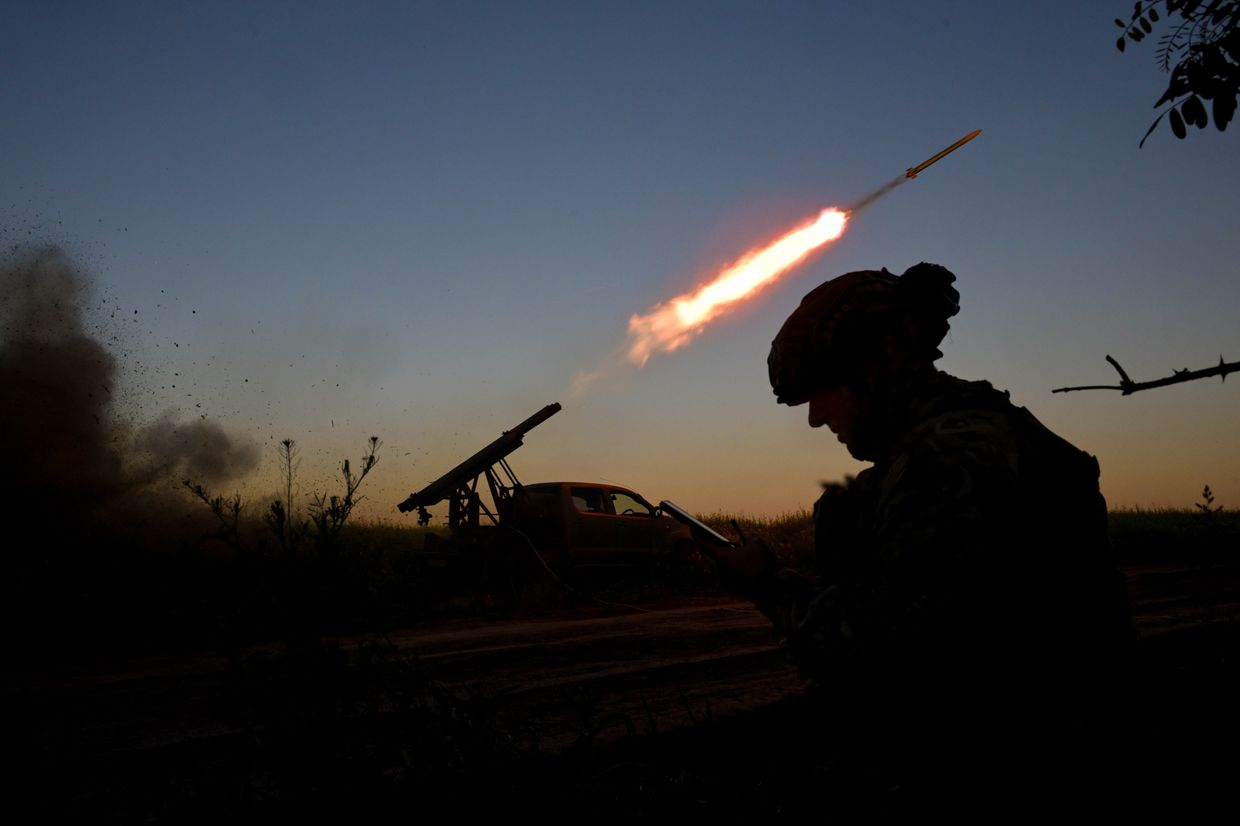 An artilleryman from the special unit Streletskyi Battalion of the Zaporizhzhia police fires a shot from a Partizan rocket launcher near Orikhiv, Zaporizhzhia Oblast, Ukraine, on May 23, 2025.