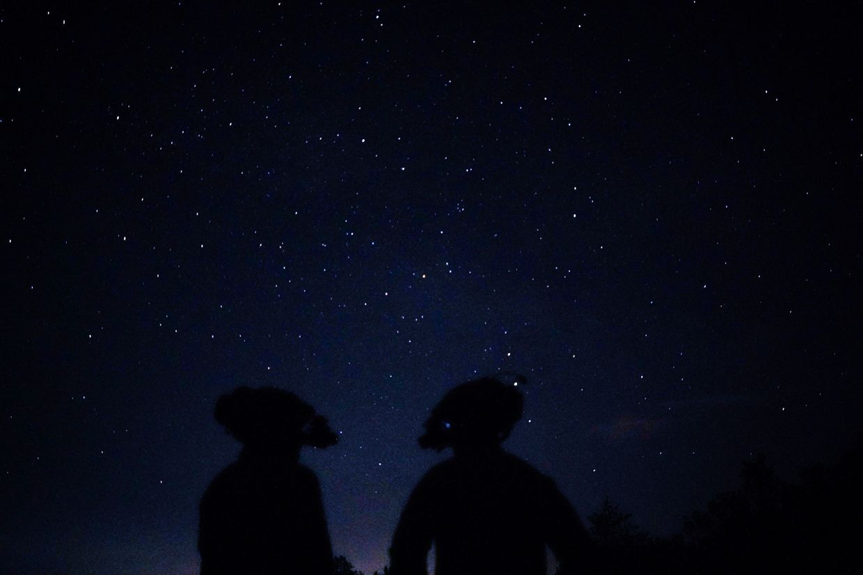 Special Forces fighters of the Ukrainian Defence Forces conduct a night training mission in Ukraine on June 2025.