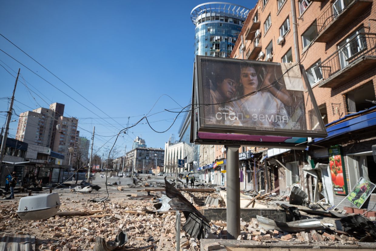 Debris from damaged buildings lies in a street after shelling near Lukianivska metro station in Kyiv, Ukraine, on March 14, 2022.