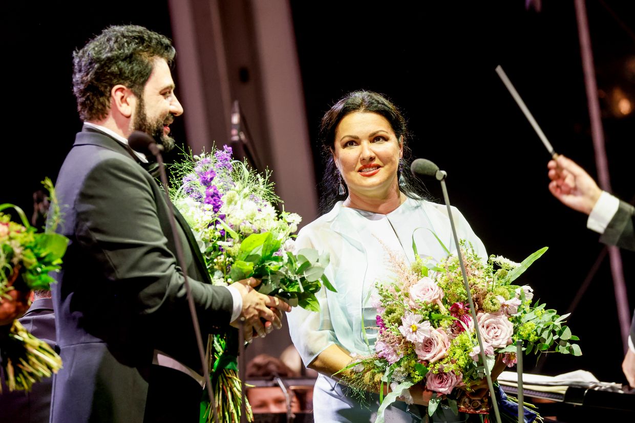 Pianist Malcolm Martineau and opera singer Anna Netrebko attend a recital and charity dinner during the Munich Opera Festival at the Nationaltheater in Munich, Germany, on July 17, 2019.Azerbaijani opera singer Yusif Eyvazov and Russian opera singer Anna Netrebko, perform on stage at the Thurn & Taxis Castle Festival in Regensburg, Germany, on July 23, 2022.