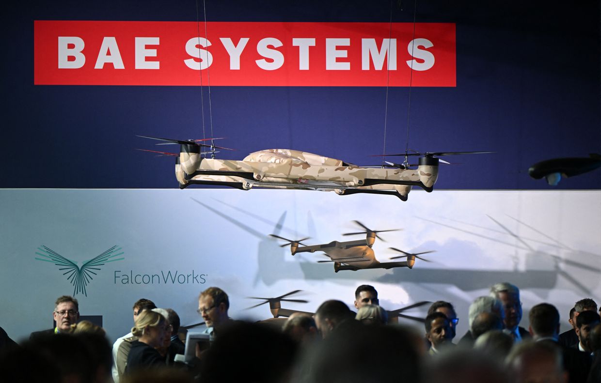 Delegates look at FalconWorks unmanned aerial vehicles (UAV) displayed at the BAE Systems stand in Farnborough, United Kingdom, on July 22, 2024.