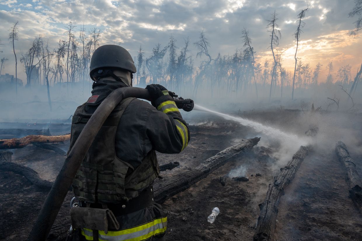 Firefighters extinguish a fire after a Russian bomb explosion in Kharkiv Oblast, Ukraine, on Sept. 17, 2024.