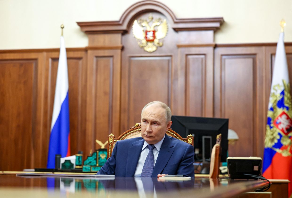 Russian President Vladimir Putin attends a meeting with the children’s rights commissioner at the Kremlin in Moscow on June 2, 2025.