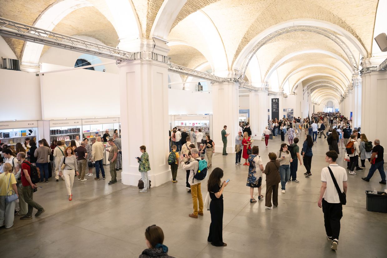 People attend the 13th International Book Arsenal Festival in Kyiv, Ukraine, on May 31, 2025. 